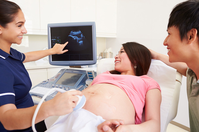 Couple at the doctor's getting an ultra sound